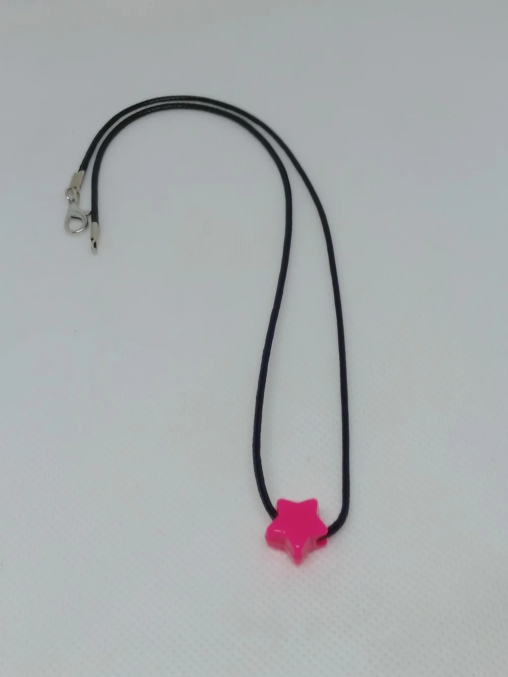 Pink Star Pendant Necklace on Black Cord